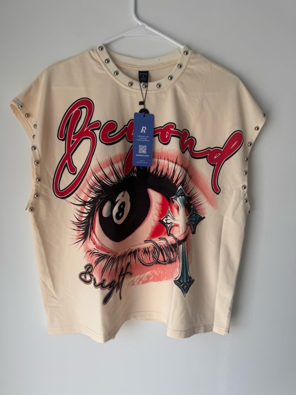Graphic Studded Cream Tee with Red Eye Motif